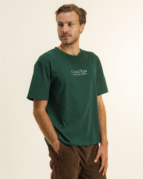 Front view of the Feel the ocean's heartbeat T-shirt on a male model, medium shot showing the fit.